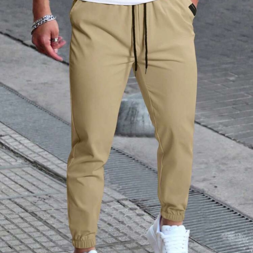 Manfinity Homme Men's Solid Color Drawstring Waist Pocketed Long Pants Slacks